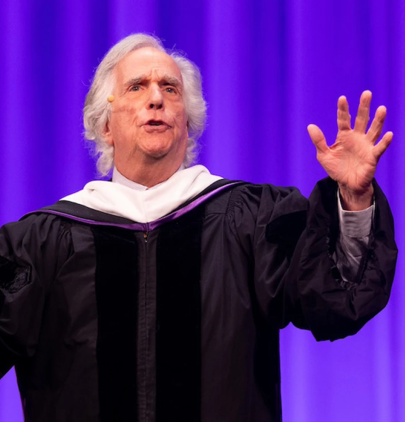 Henry Winkler delivers the keynote address onstage at Emerson College’s Commencement ceremony.